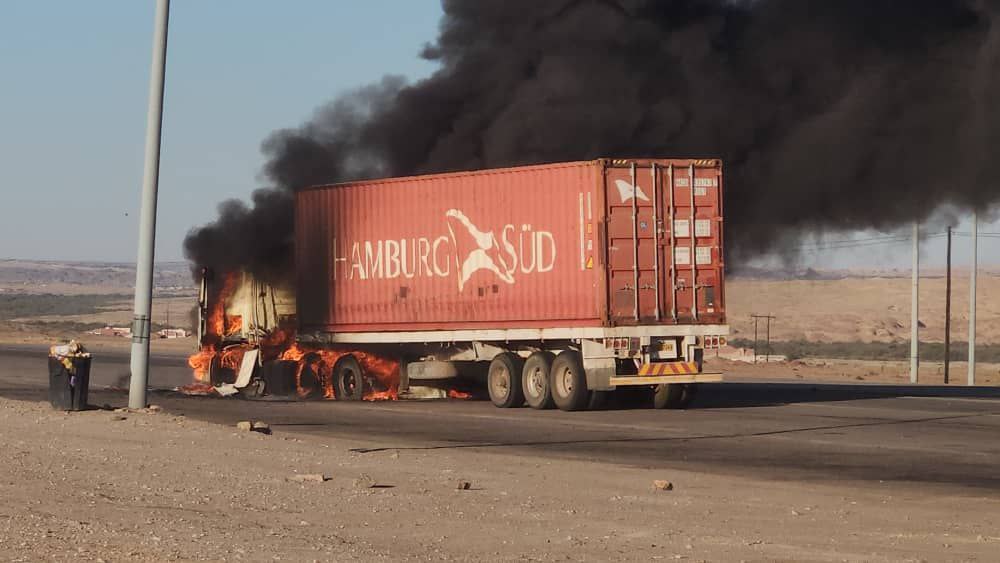 a freight truck traveling from Walvis Bay to Windhoek caught fire near the Swakopmund roadblock area along the B2 highway