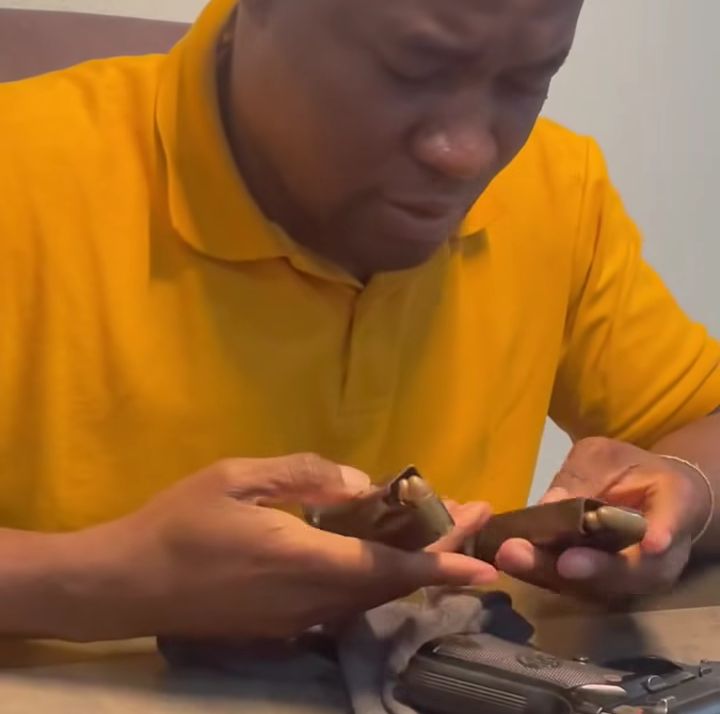 Amupanda clean his loaded firearm