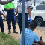 Panic Run Ends in Injury as Man Collides with Moving Vehicle During Police Patrol