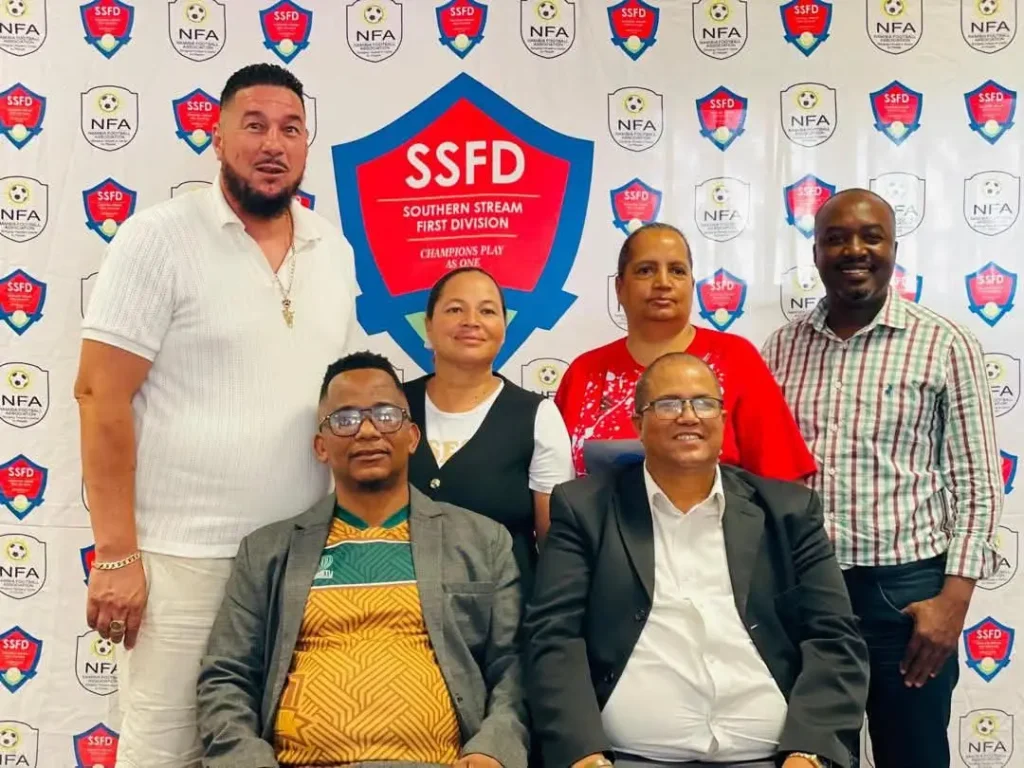 Standing, from left: Sebastian Lawrence, Suzel Cloete, Marilyn Klaaste and Likkius Elias. Seated: Andries Wimmerth (Deputy Chairperson) and Jakobus Murs Markus (Chairperson). Eric Wilmot of DTS FC was not pictured | Image credit: Phantom Connexion Media